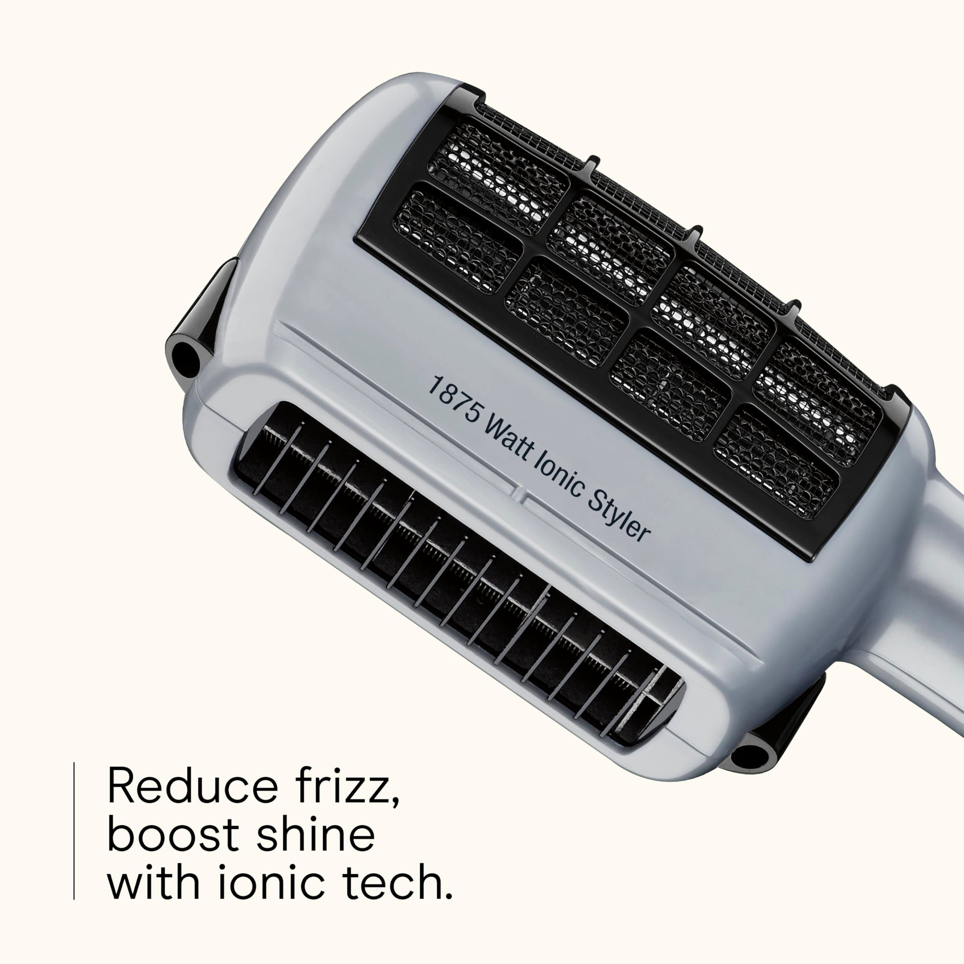 Close-up of the dual voltage switch and heat speed control settings on the Conair styler handle