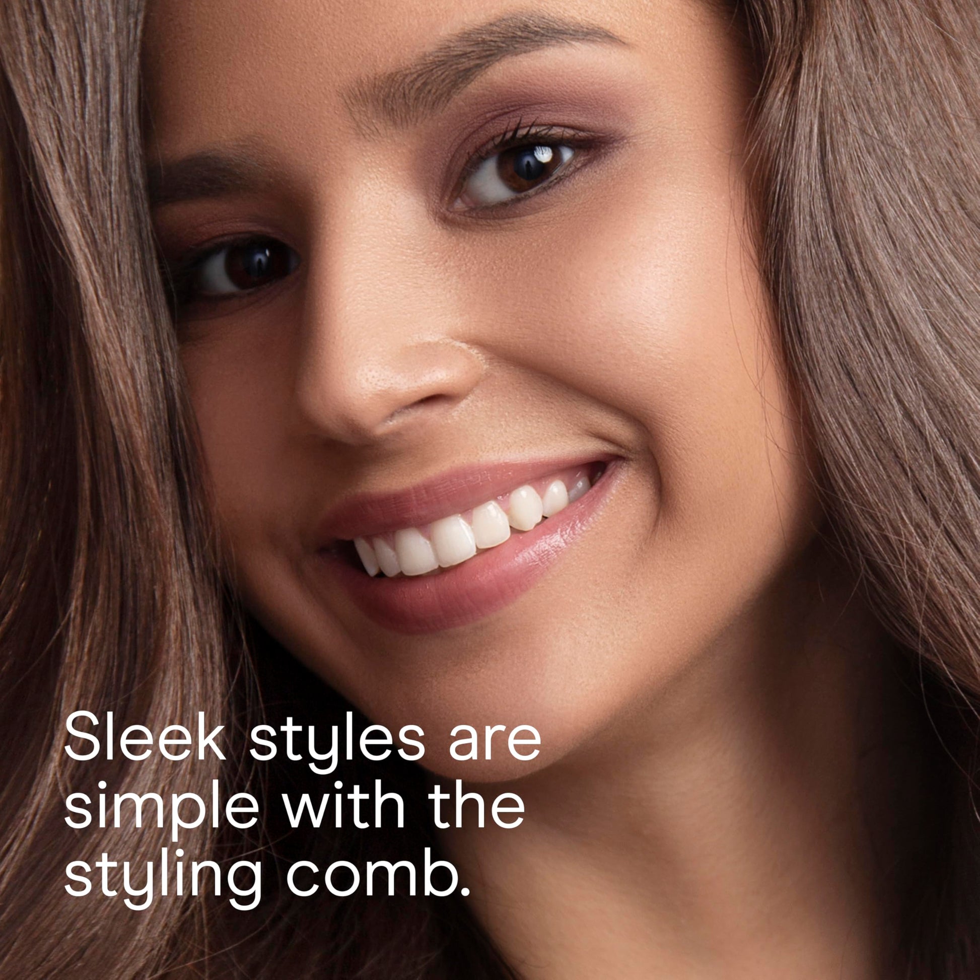 Side view of the premium Conair 3-in-1 silver travel hair dryer showing the lock button
