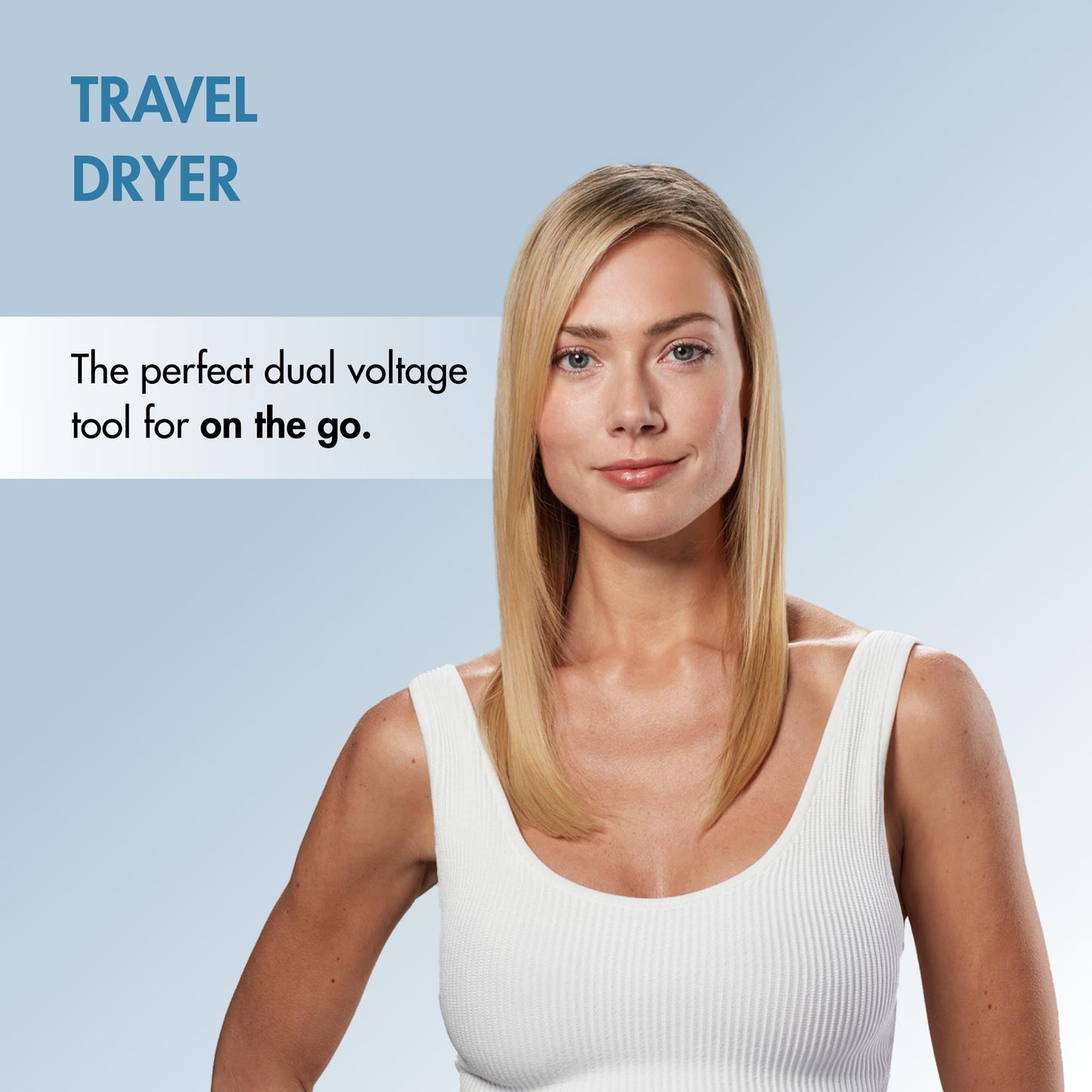Authentic BaBylissPRO blue titanium travel dryer unboxed on a clean surface showing global power compatibility features.