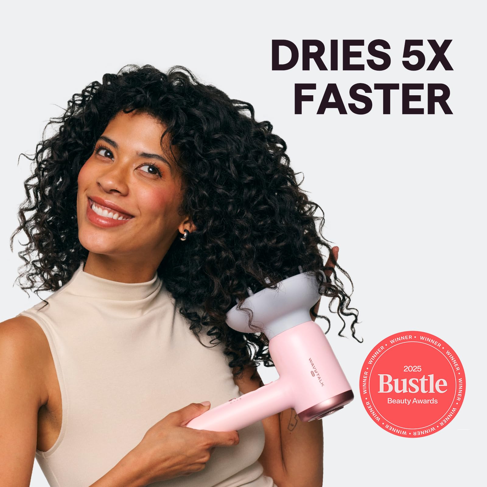 Wavytalk pink ionic hair dryer showing speed and temperature buttons