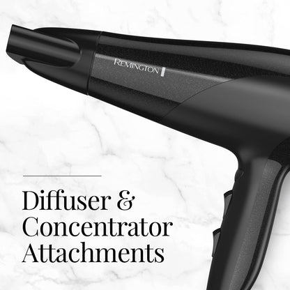 Close view of the Remington hair dryer handle showing the three heat switches and two speed control buttons.