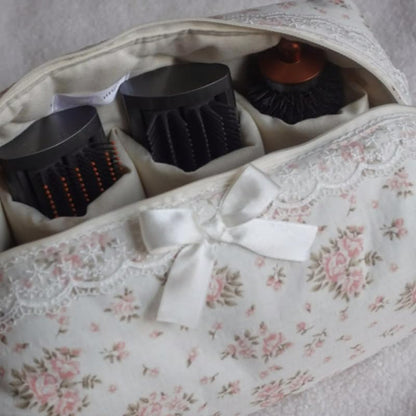 Cohawk floral travel case unrolled showcasing the detachable heat resistant mat layout.