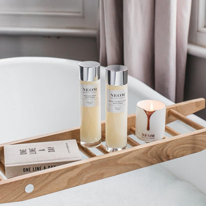 Texture of Neom Real Luxury Bath Foam in a bath