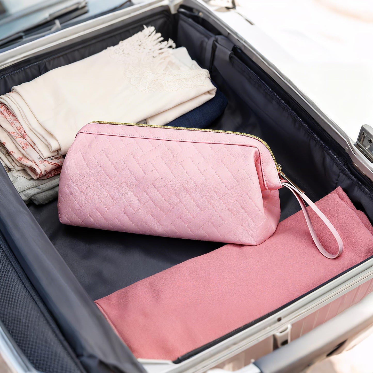Lacdo travel organizer handle lanyard hanging on a bathroom vanity hook