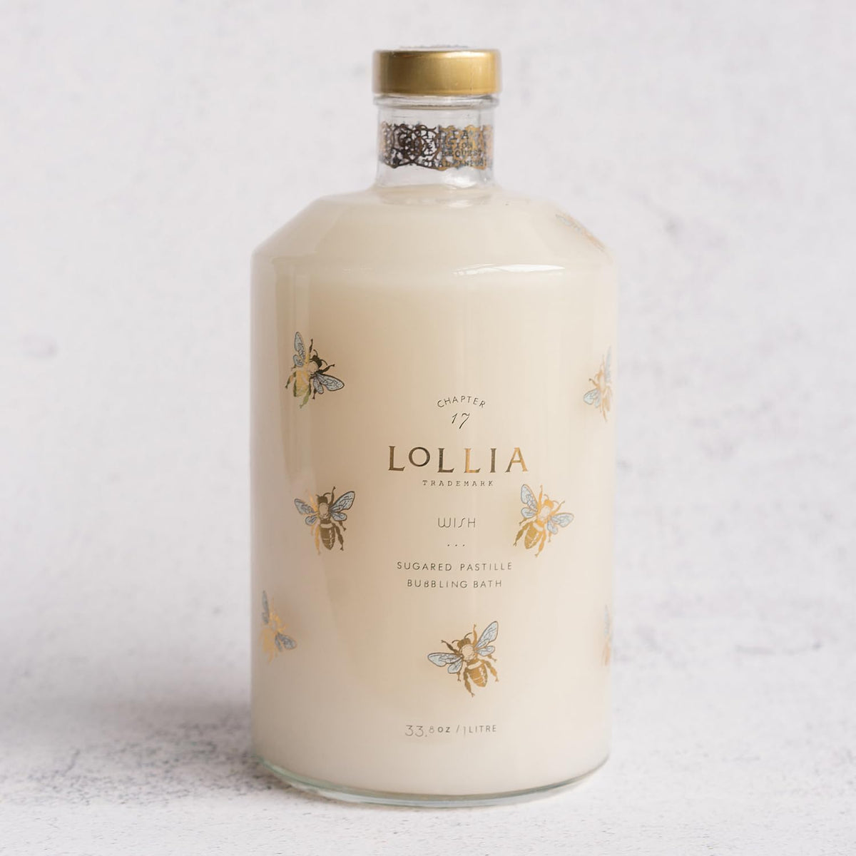 Decorative Glass Bottle Of Hydrating Bubble Bath With Golden Bee Accents