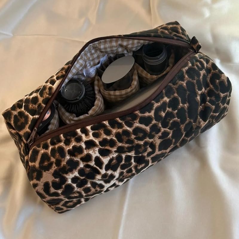 KCWVSIE protective styling tool bag placed next to travel luggage