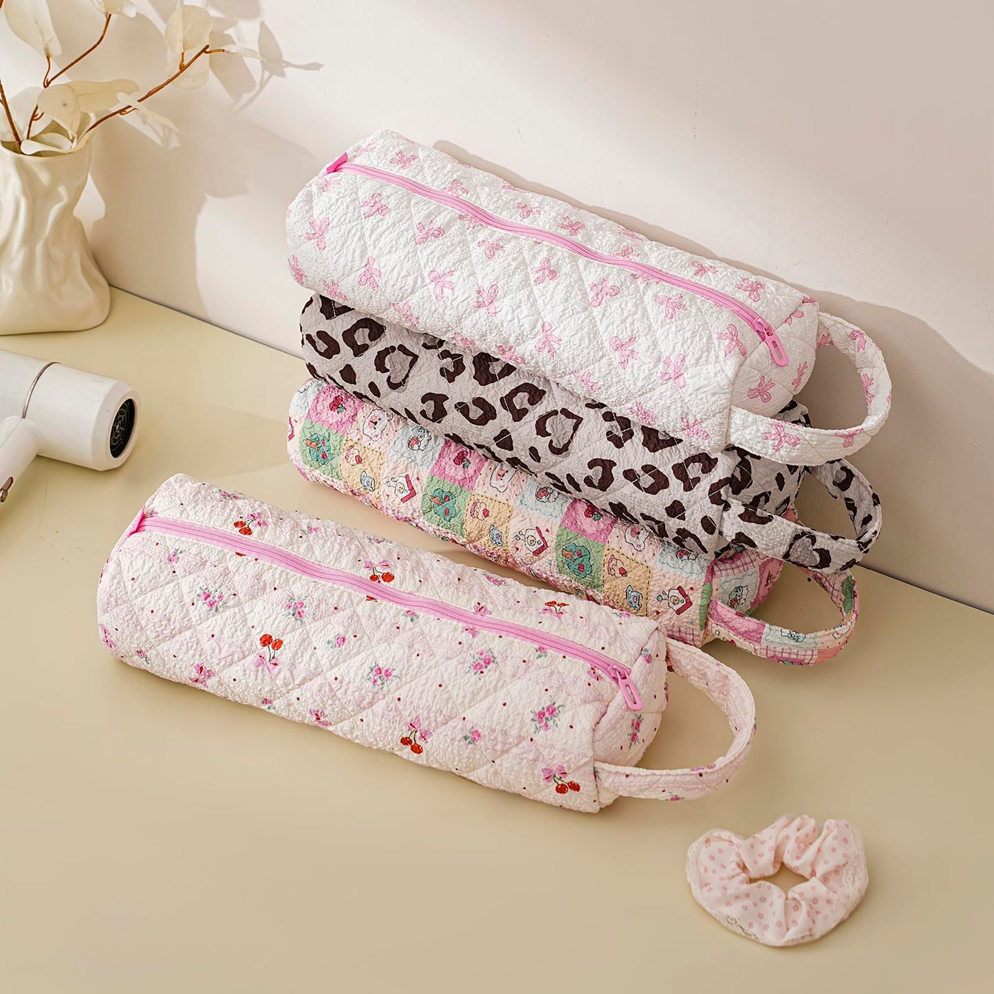 RSRSLEII lightweight foldable curling iron travel bag being packed into a suitcase