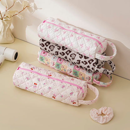 RSRSLEII lightweight foldable curling iron travel bag being packed into a suitcase
