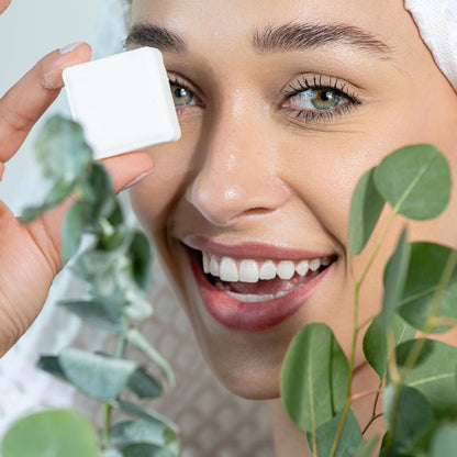Natural menthol and eucalyptus shower bomb tablet dissolving under steam