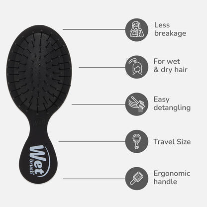 Compact Wet Brush travel hairbrush in hand