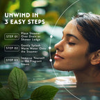 Dissolving shower steamer tablet releasing aromatic essential oil vapors in a steaming bathroom