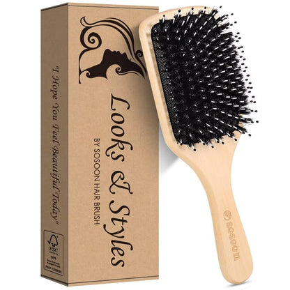 Using tail comb to clean Sosoon paddle brush