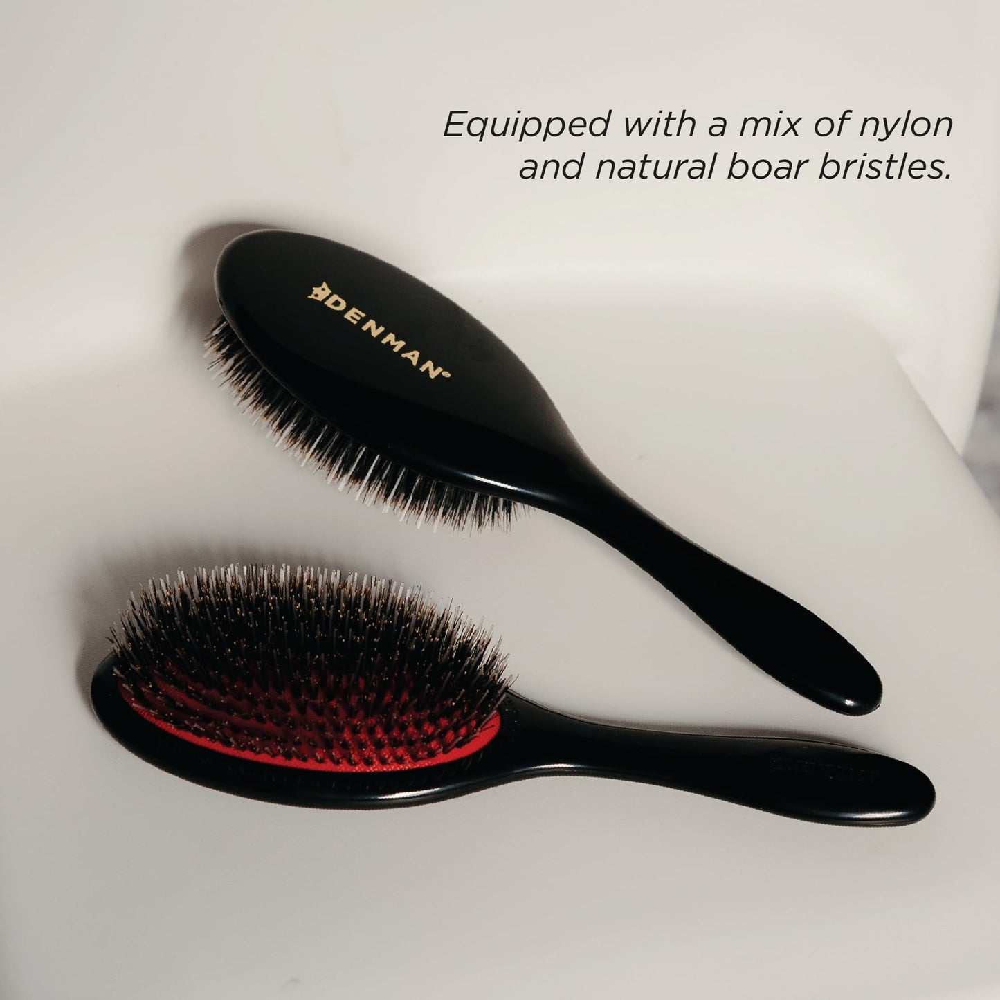 Authentic Denman professional salon quality cushion brush packaging and product overview.