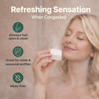 Premium shower bomb tablet fizzing on a bathroom floor releasing essential oil steam