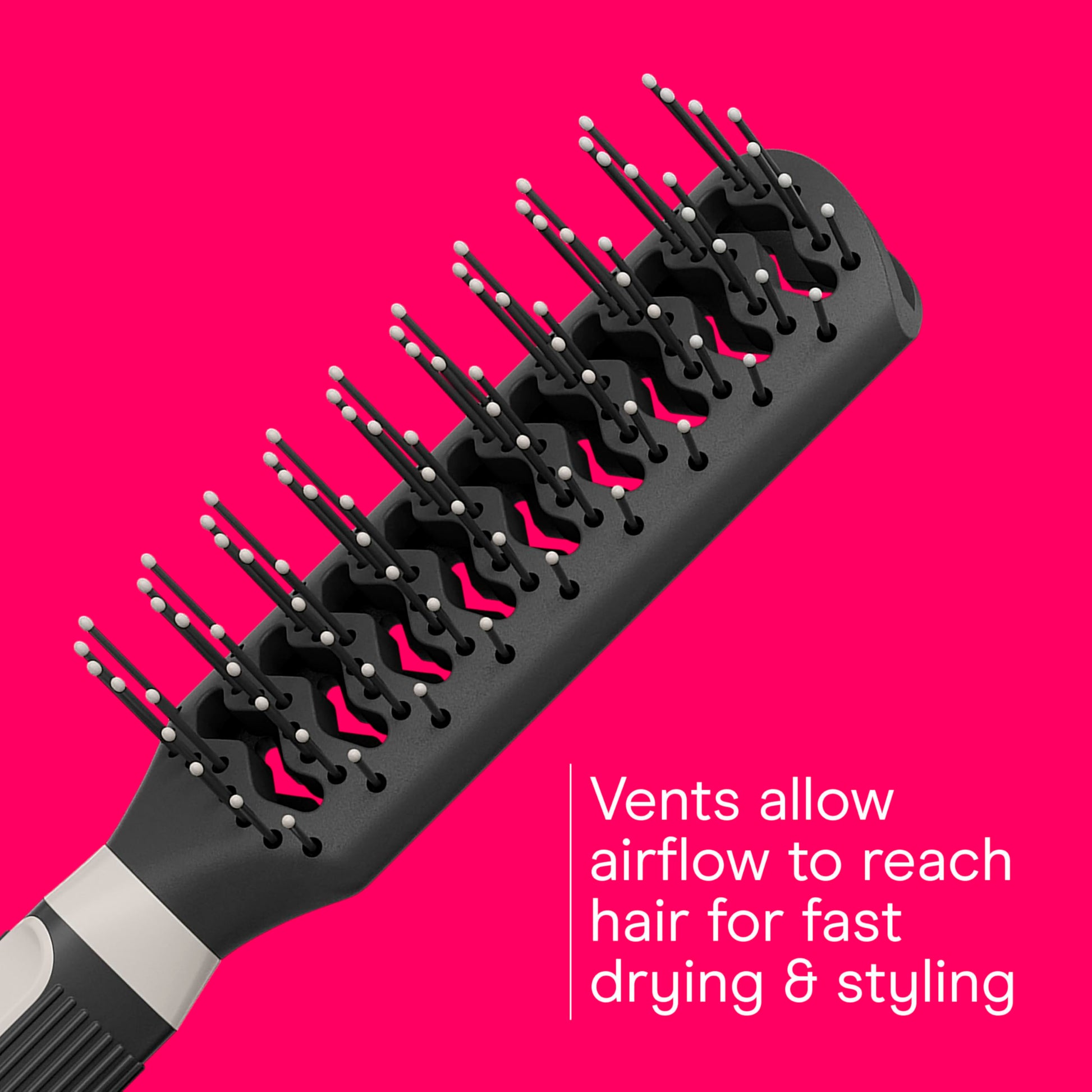 Ergonomic soft ridged rubber grip handle details on the Conair Grip and Style hairbrush