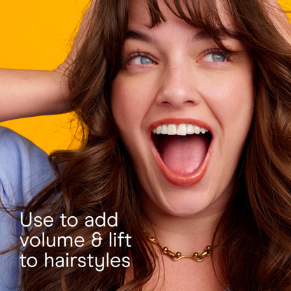 Conair professional hair brush set being held to showcase the non-slip handle grip comfort