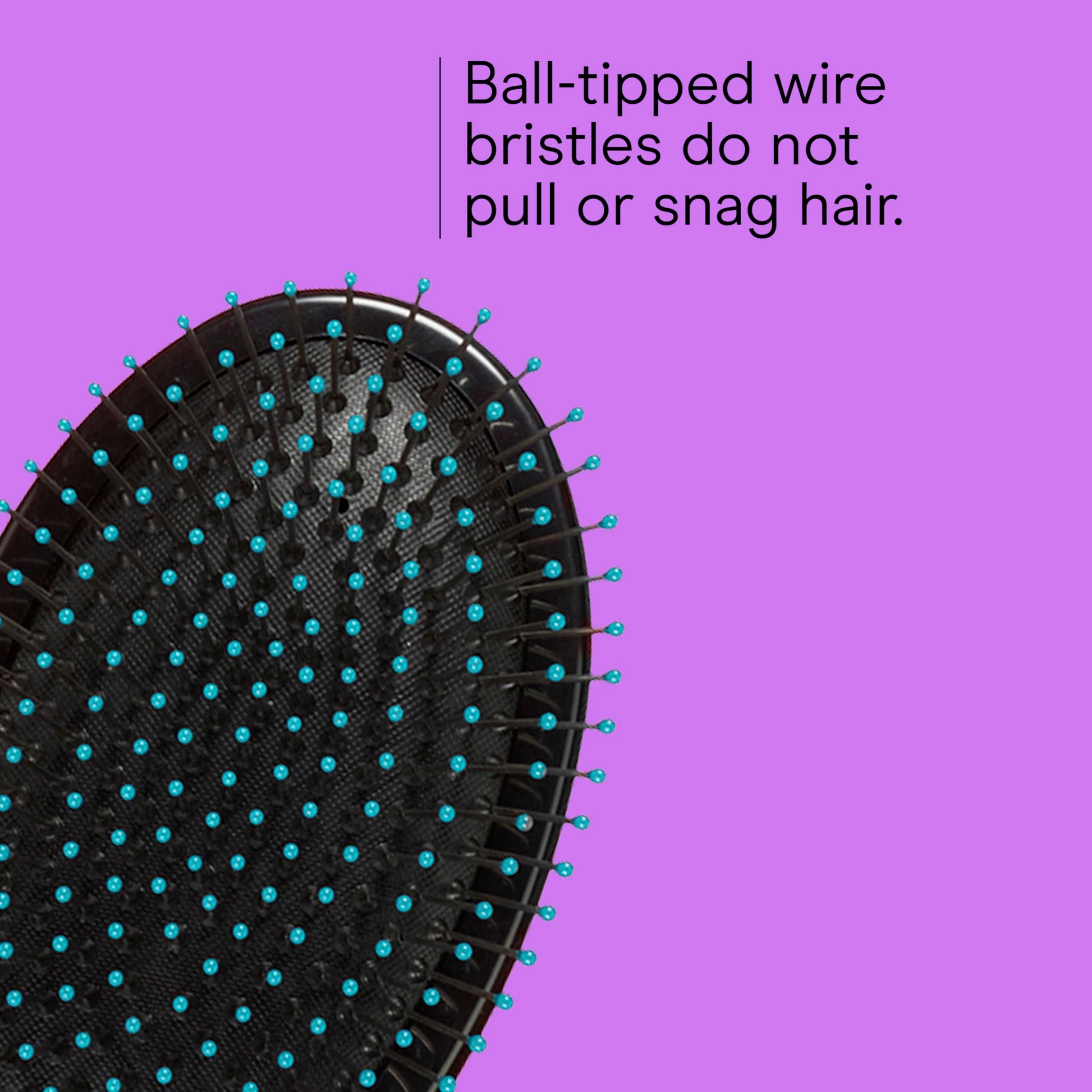 Conair professional grooming brush displaying the shock absorbing flexible rubber cushion pad