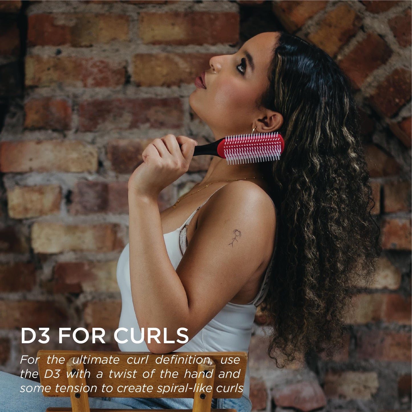 Detachable rubber pad component of the classic Denman D3 curl defining brush