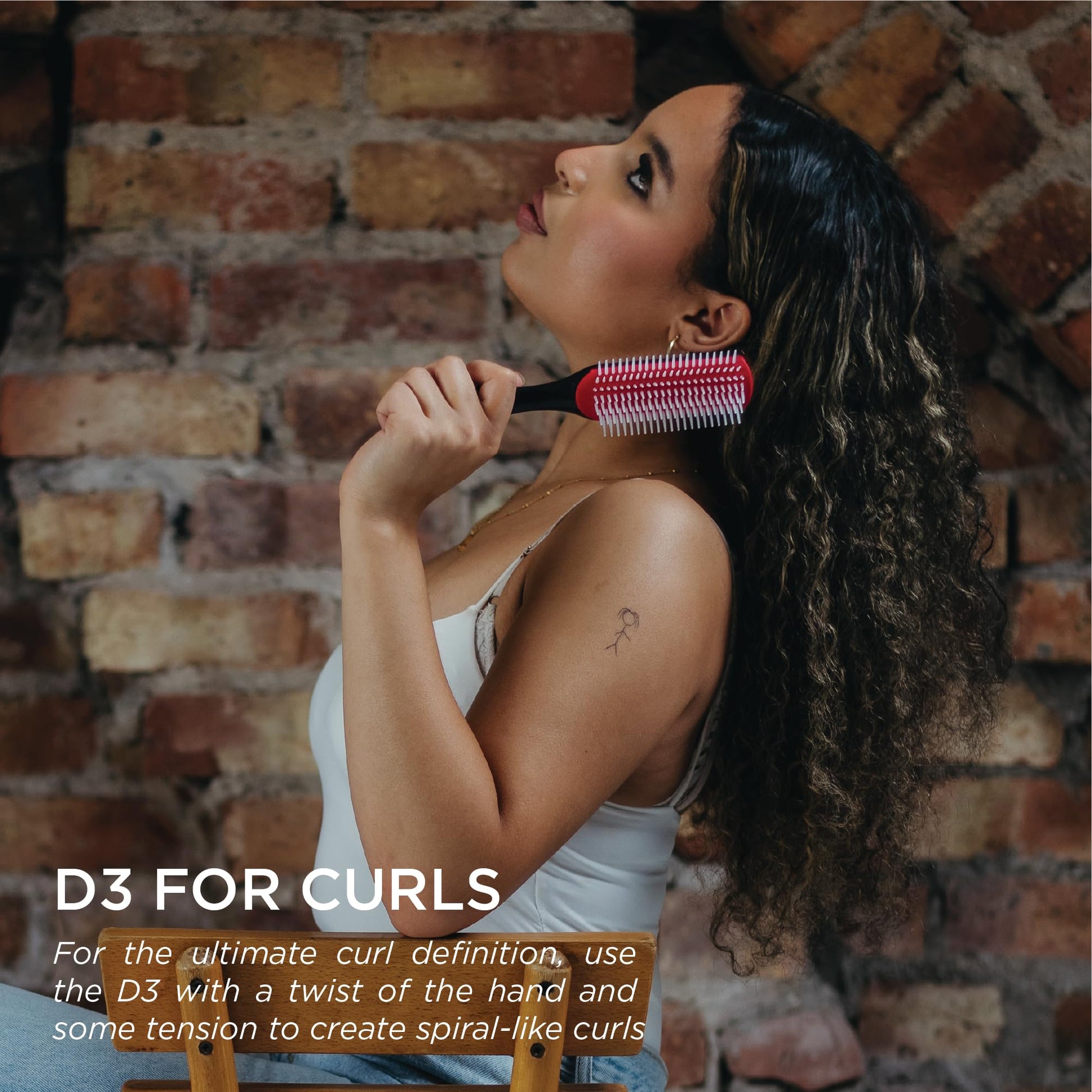 Detachable rubber pad component of the classic Denman D3 curl defining brush