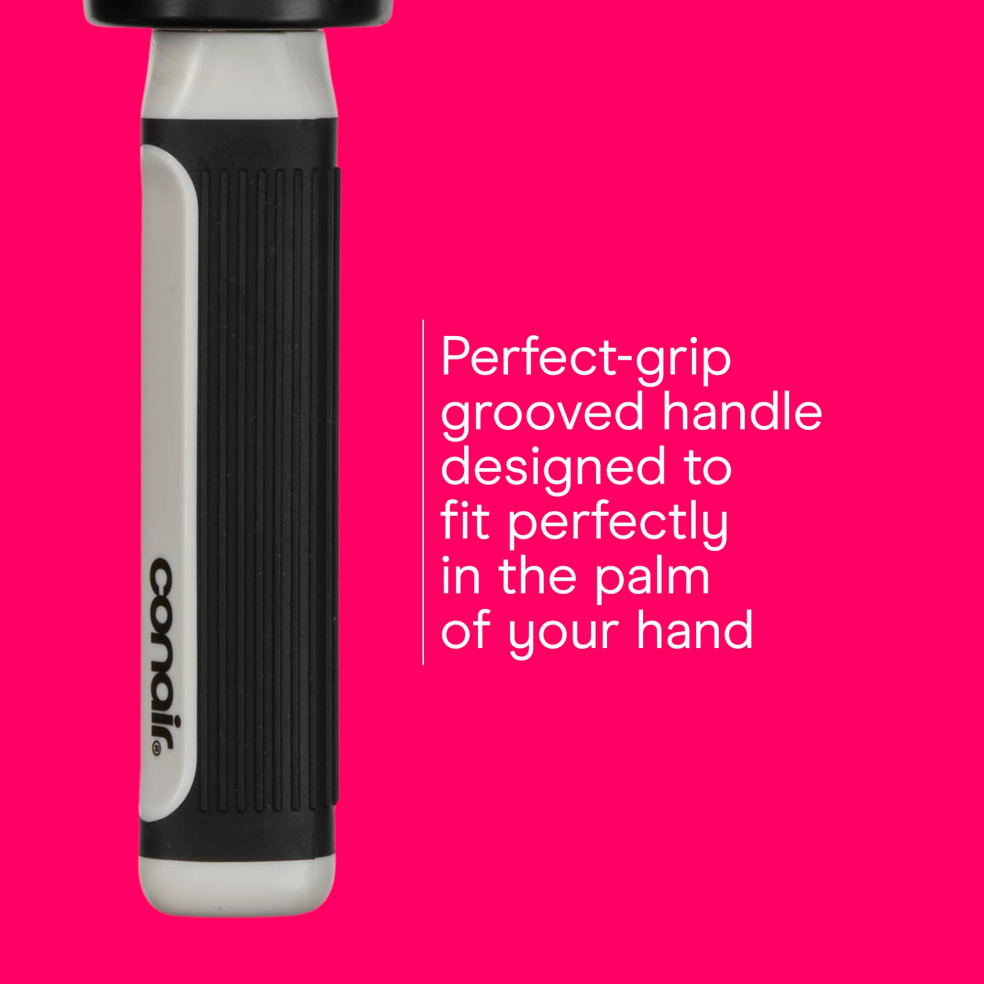 The round hairbrush being held to demonstrate the comfortable control and sizing for curly hair care.