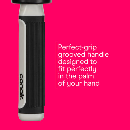 The round hairbrush being held to demonstrate the comfortable control and sizing for curly hair care.