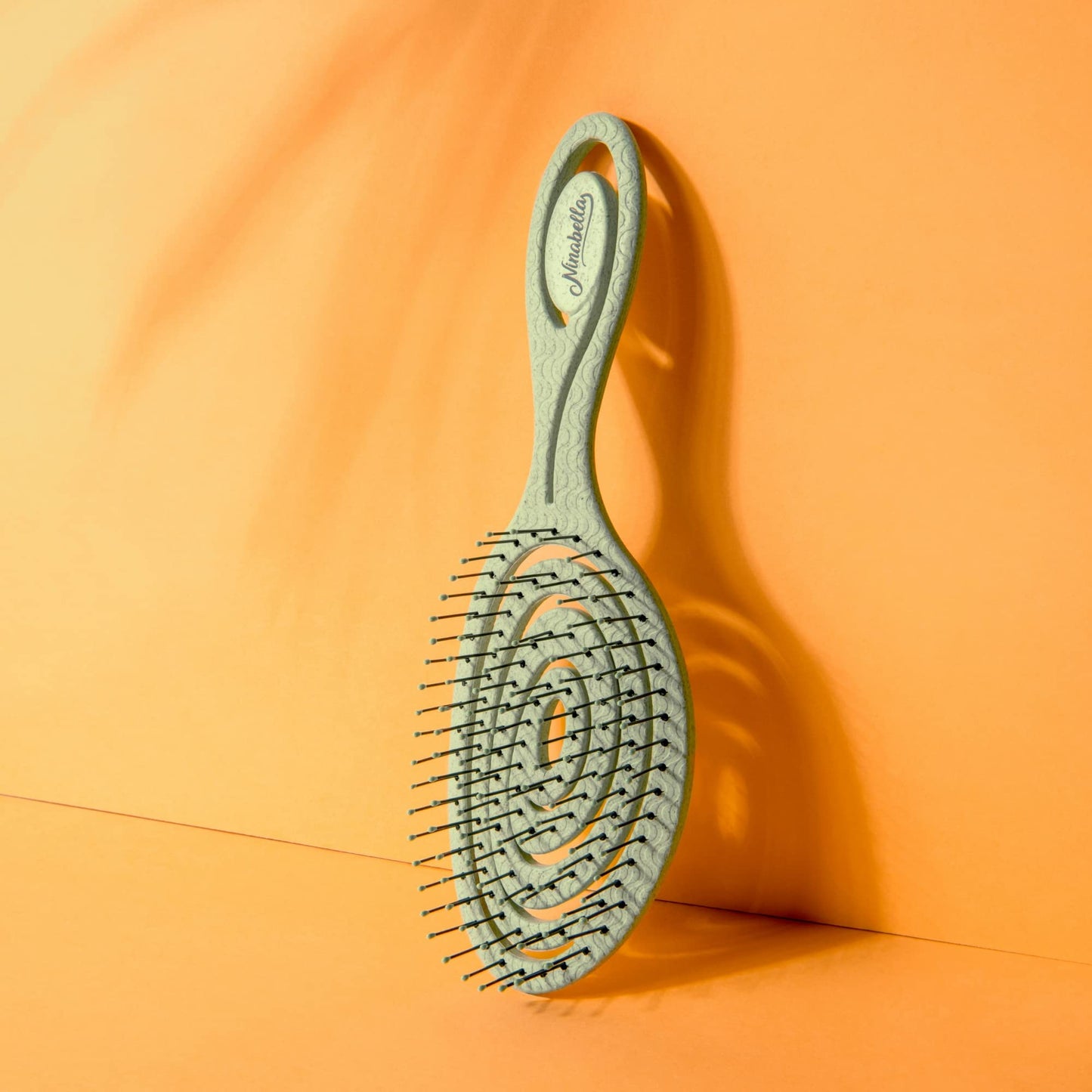 Close up of Ninabella sustainable bio-plastic hair brush bristles