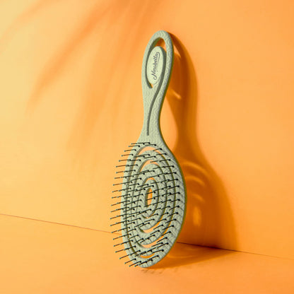 Close up of Ninabella sustainable bio-plastic hair brush bristles