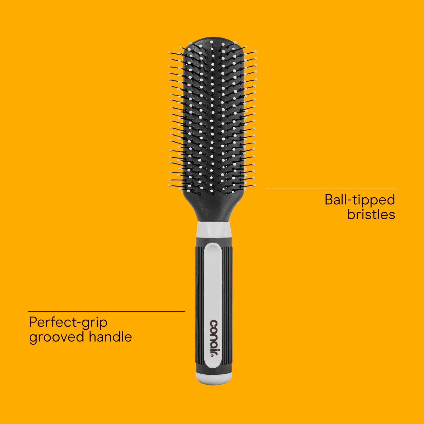 Close-up perspective of the flexible protective cushion base on the imported Conair professional grooming brush.