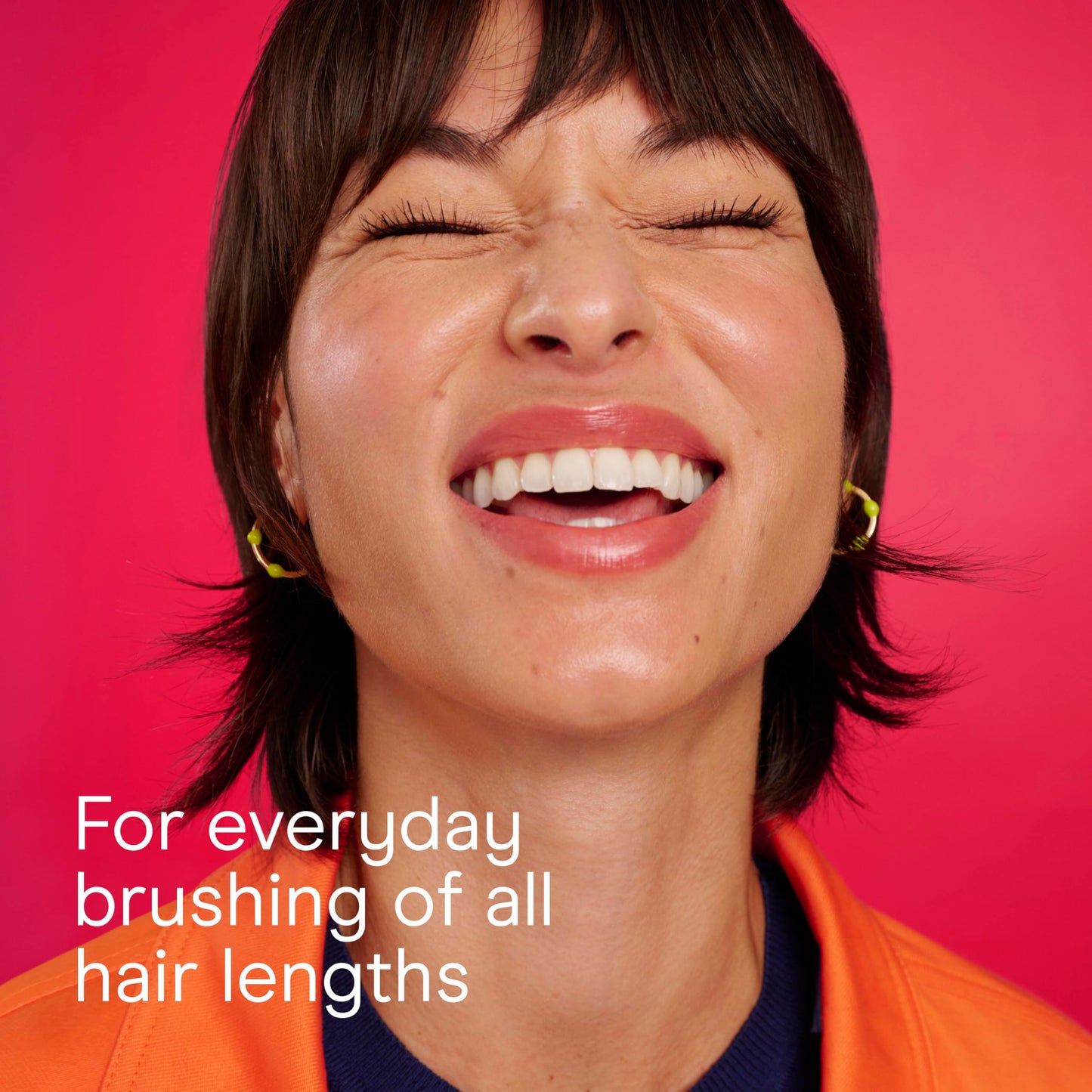 Rear view of the durable matte finish black housing on the Conair premium nylon bristle hairbrush.