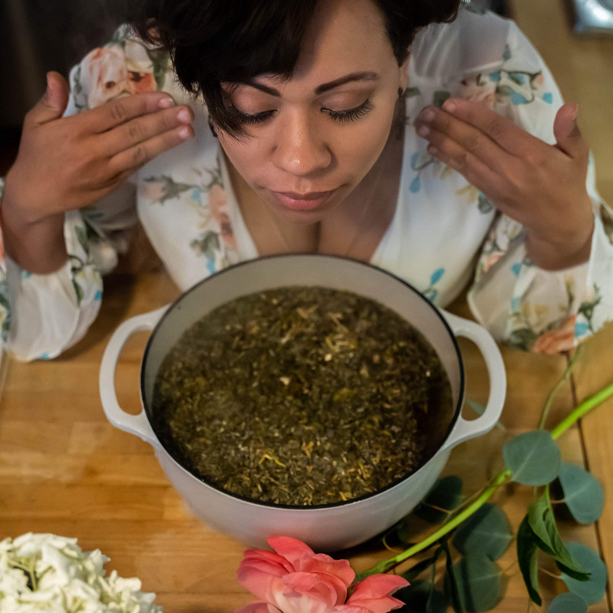 Wildflower Wellness botanical steam preparation in a glass bowl