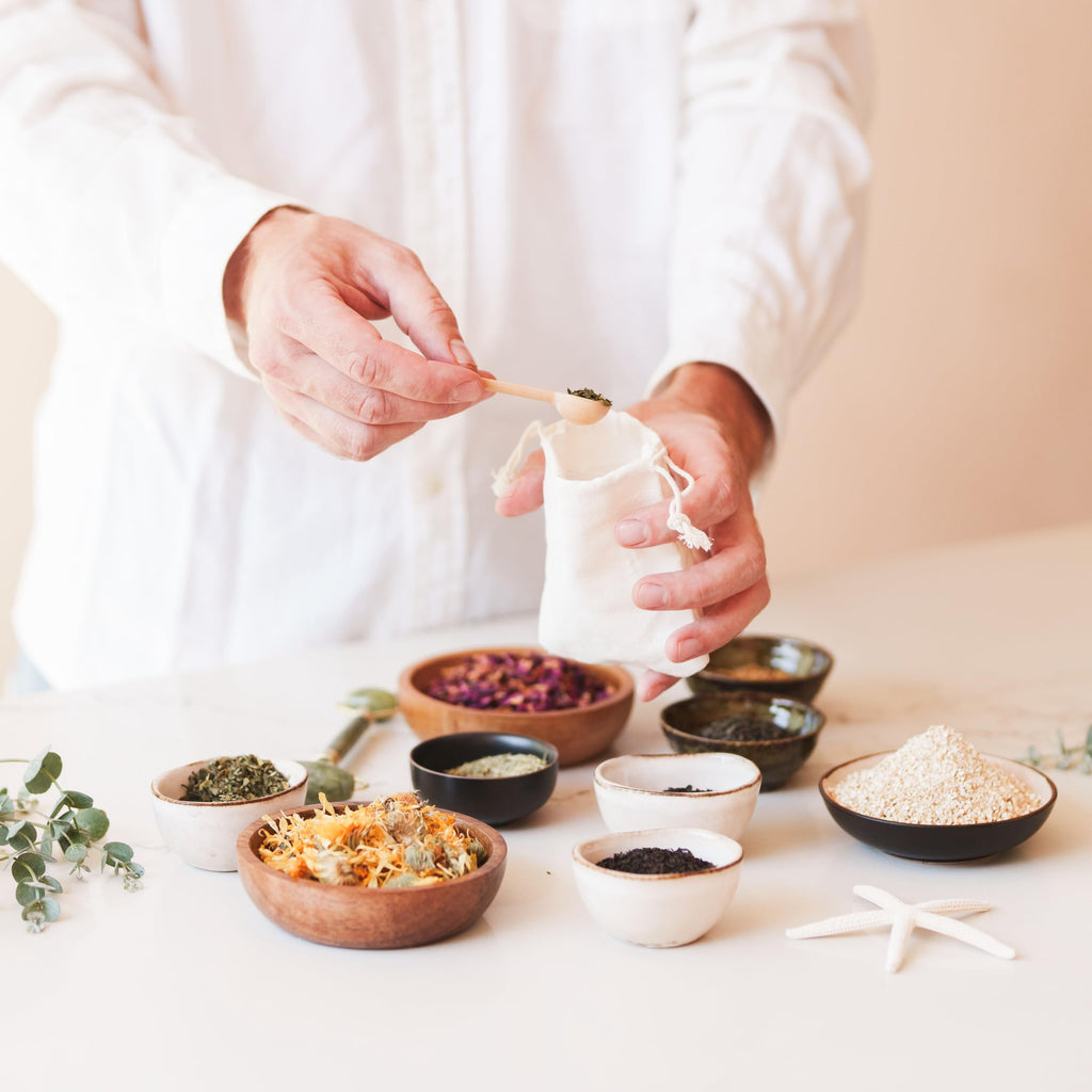 Reusable cotton brew bag and wooden tools from the OurHands set