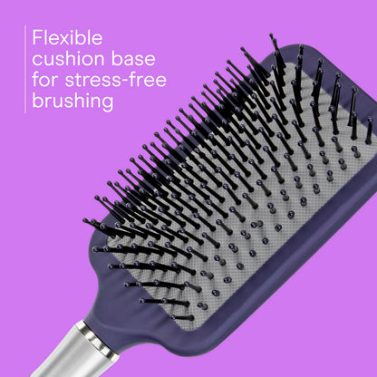 Conair soft touch handle hair brush close up showing the ergonomic grip design.