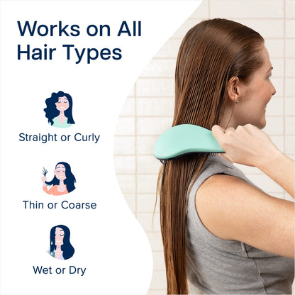 Close-up of the multi-length flexible bristles on the turquoise detangling hairbrush for wet and dry hair.