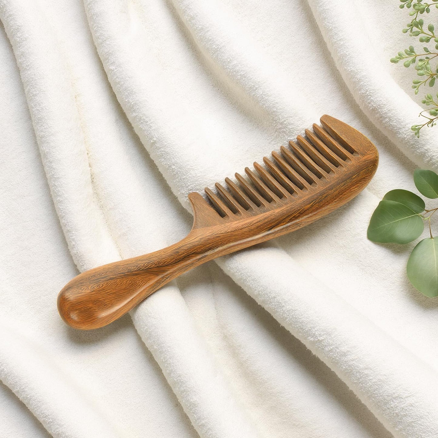 A lifestyle shot showing the authentic imported Onedor wooden comb on a vanity table setup.