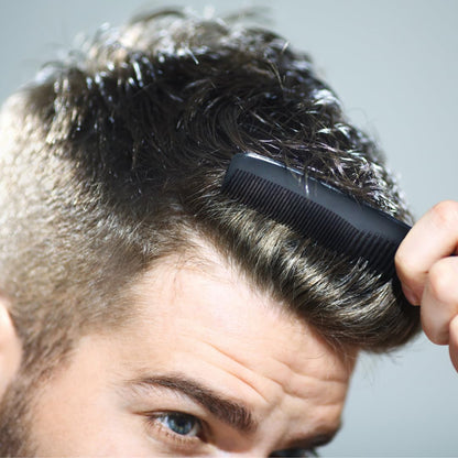 Close up of Gents pocket comb dual tooth design