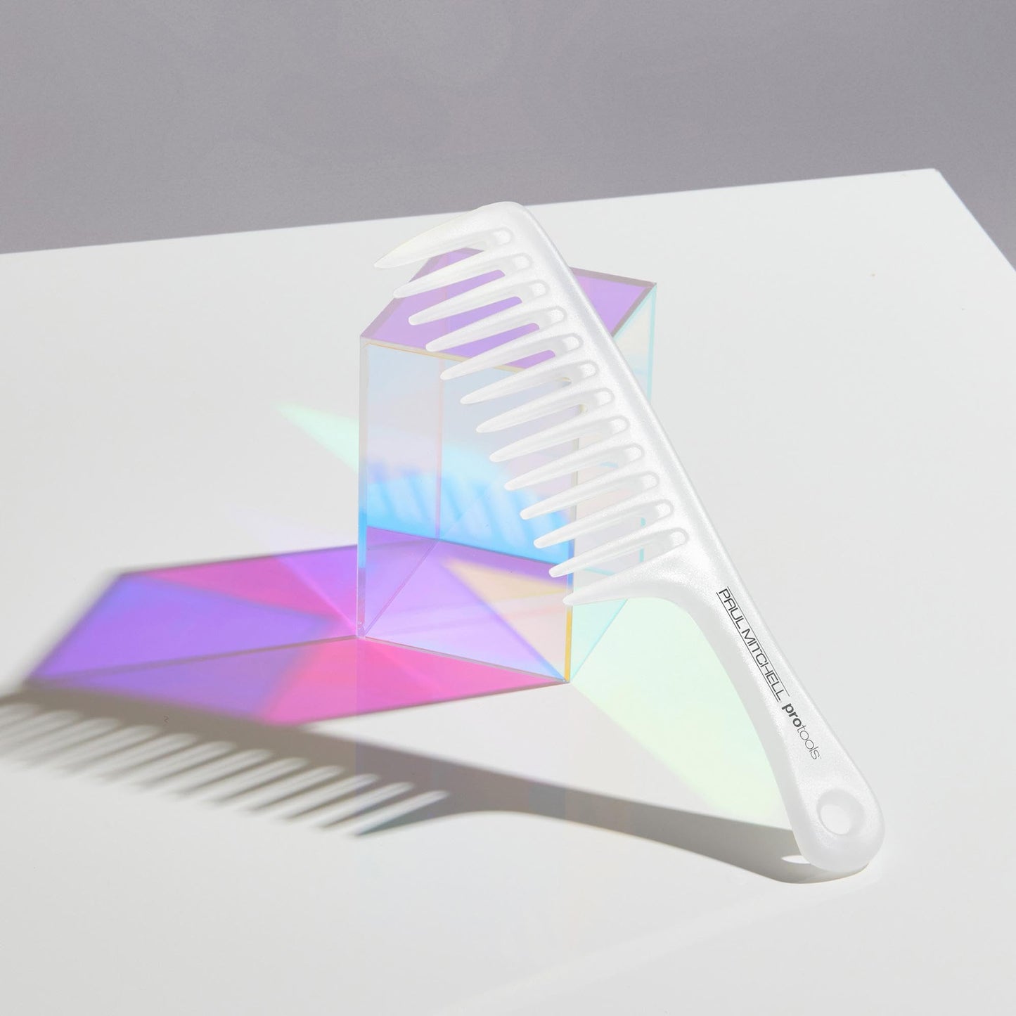 Authentic Paul Mitchell hair accessory angled view showcasing the lightweight professional build.