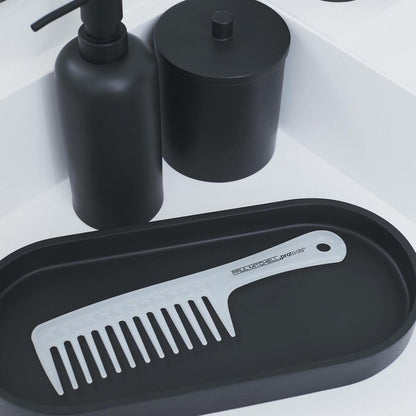 Paul Mitchell unisex detangling tool for safe dry hair combing and damage control.