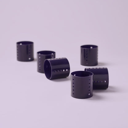 Close up of Diane jumbo purple hair rollers highlighting the ventilated airflow holes.