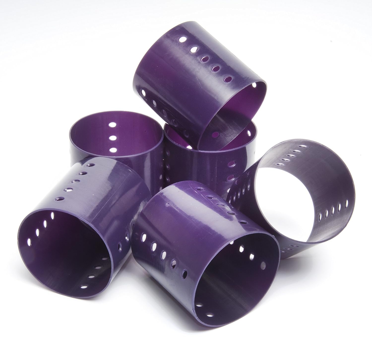 Diane large magnetic styling rollers being used with pins for secure hair volume.