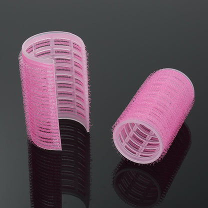 Magic DIY hair curling tools set showing the two pink self grip rollers together.