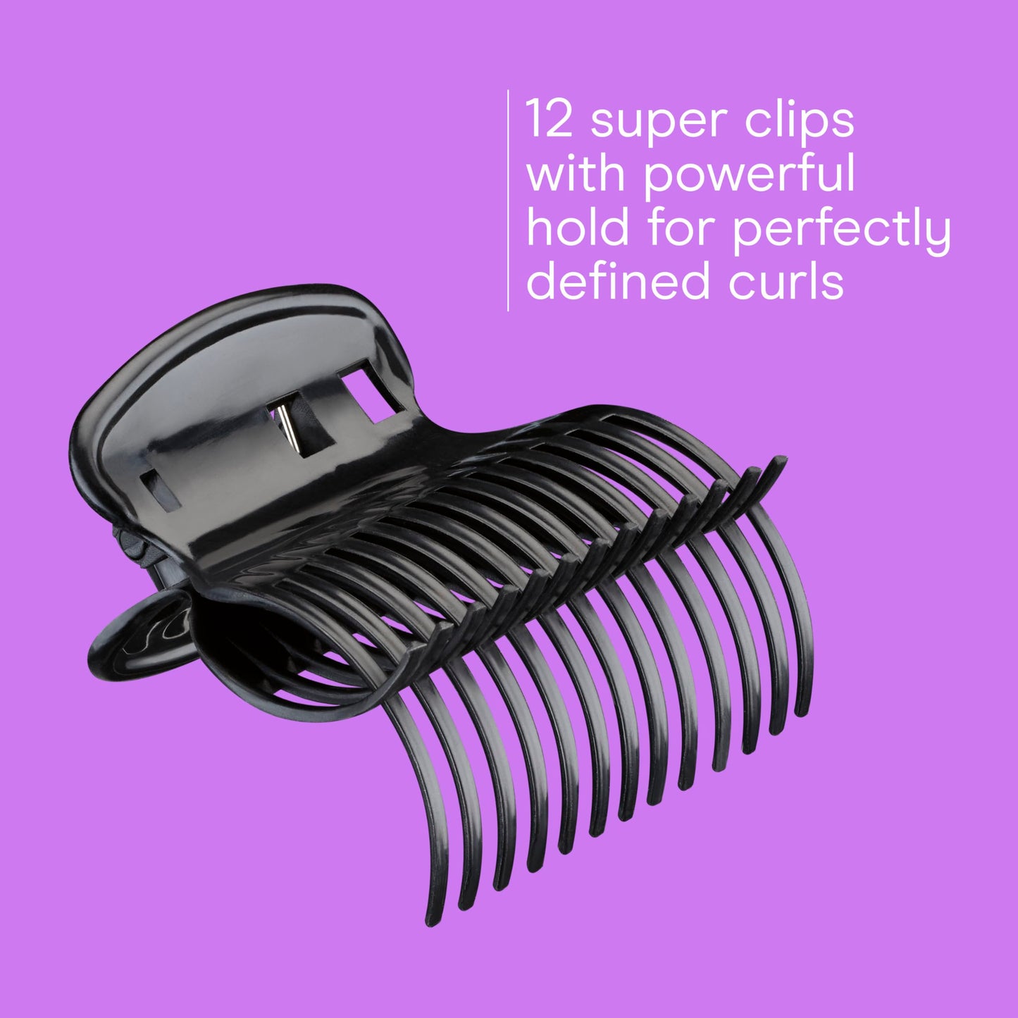 Conair jumbo heated curlers being removed from the sleek black charging station