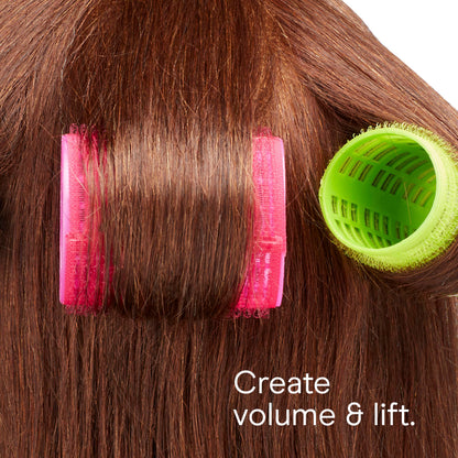 Different sizes of Conair self grip hair curlers displayed together