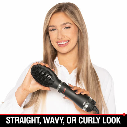 Close up view of the oval volumizing brush head attachment featuring specialized nylon and tufted bristles.