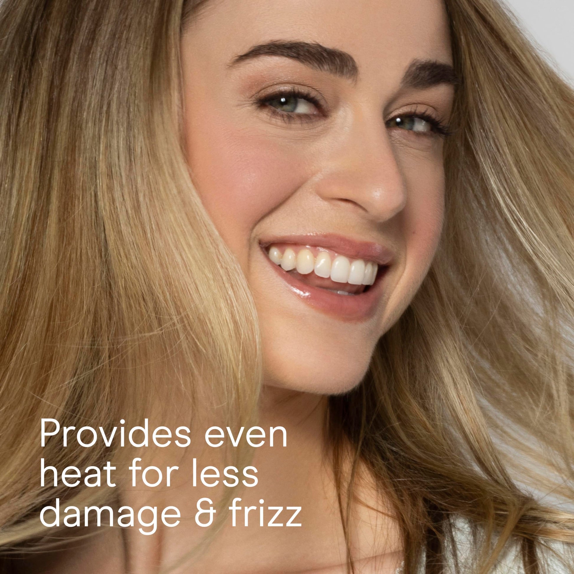 Conair professional hot air brush showing the ergonomic handle and integrated heat adjustment switch.
