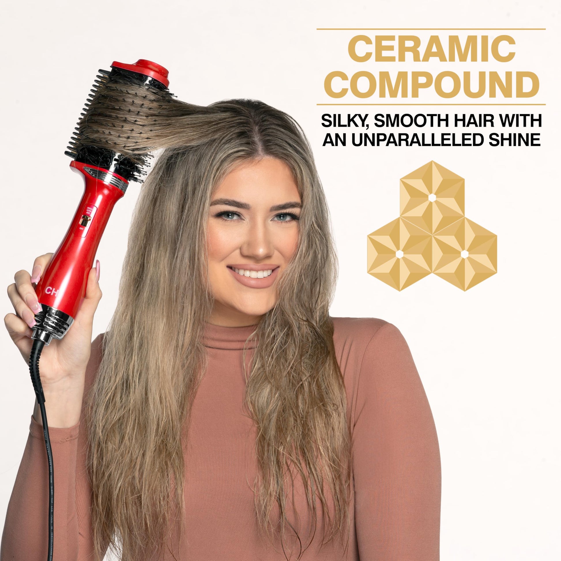 Side view of CHI volume brush highlighting the ergonomic handle design