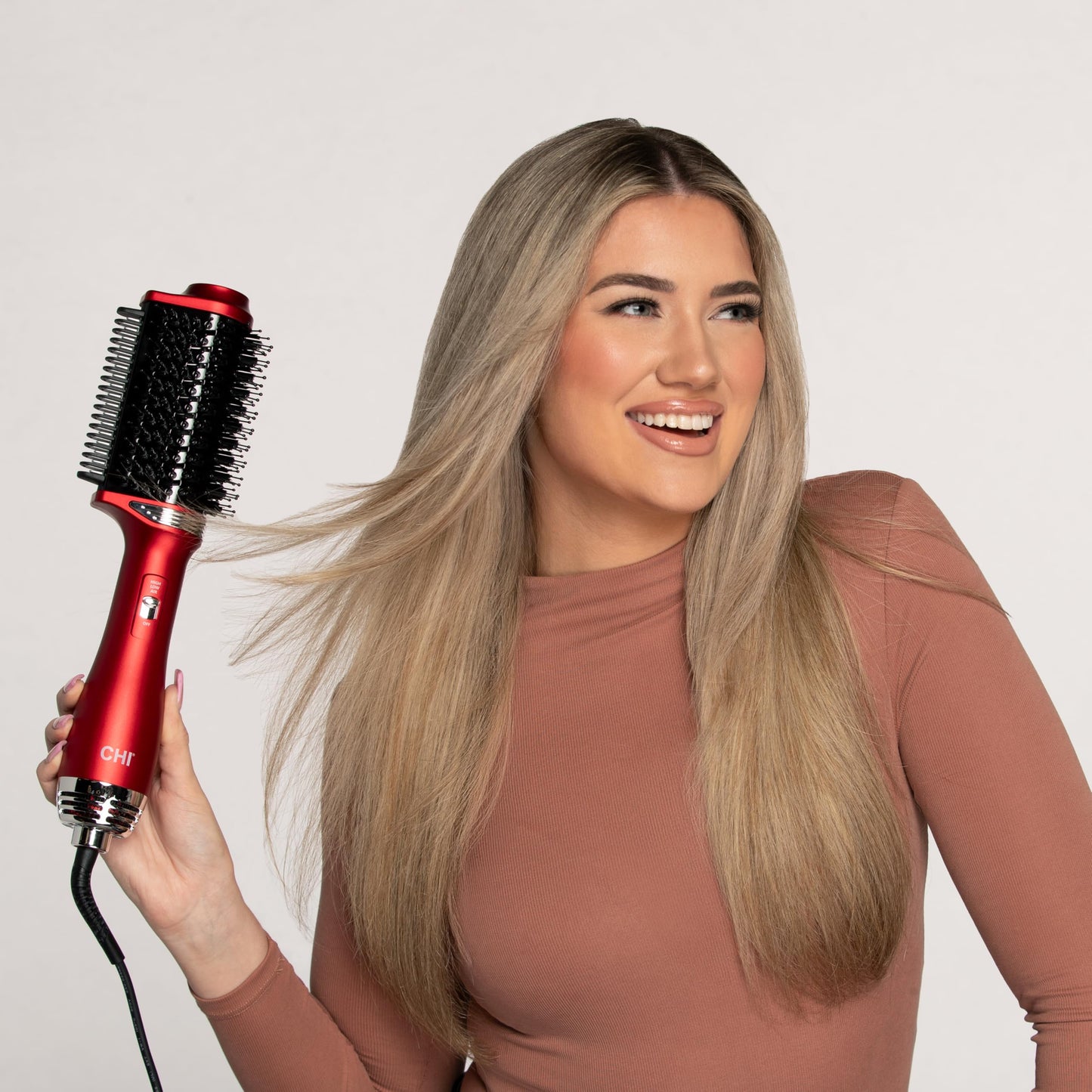 CHI hair styling tool in red showing the salon grade swivel power cord