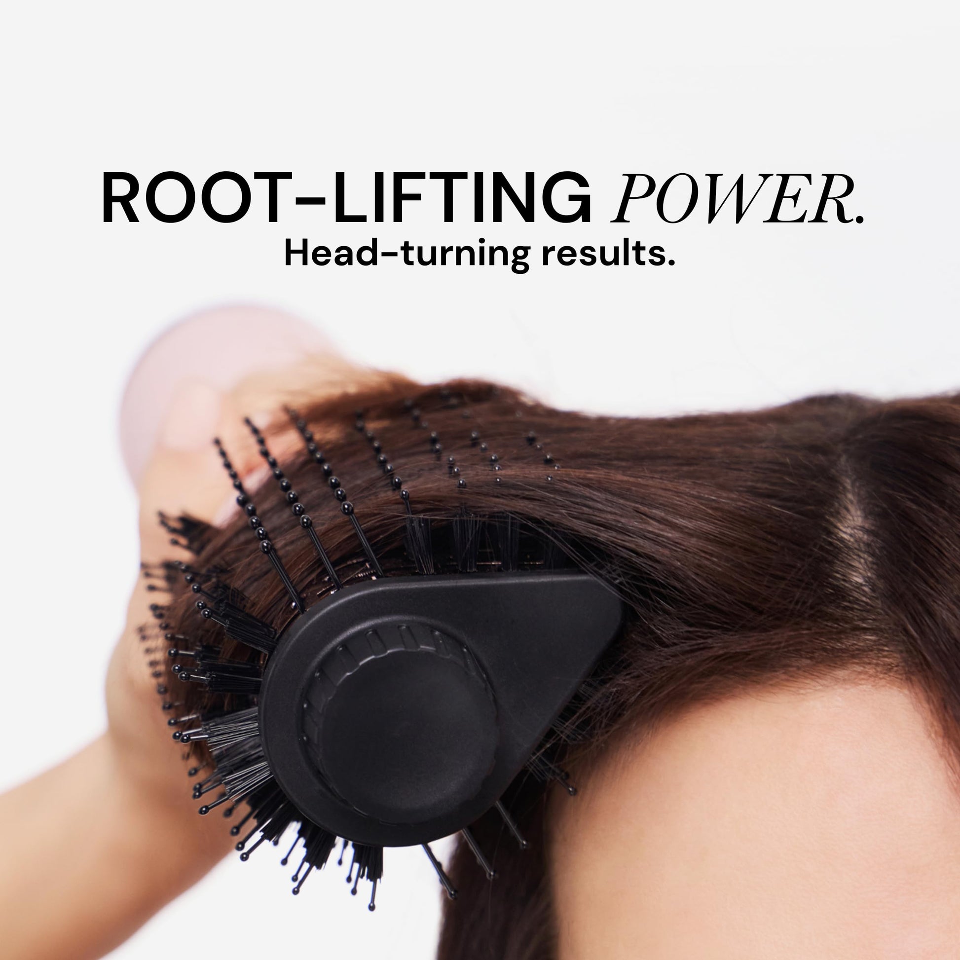 Full view of the L'ANGE HAIR 2-in-1 titanium brush dryer highlighting its ergonomic handle and professional swivel cord.