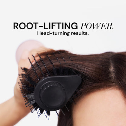 Full view of the L'ANGE HAIR 2-in-1 titanium brush dryer highlighting its ergonomic handle and professional swivel cord.