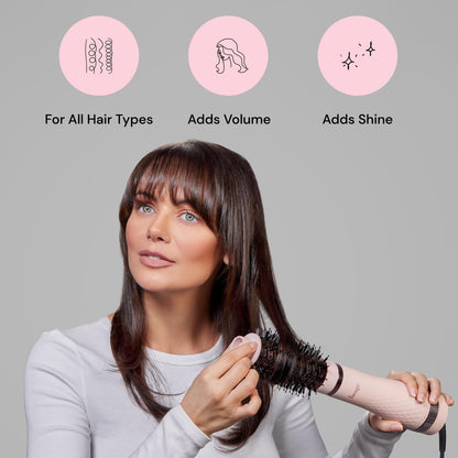 The ergonomic handle and heat settings dial of the L'ANGE HAIR 1000 watt hot air styler.