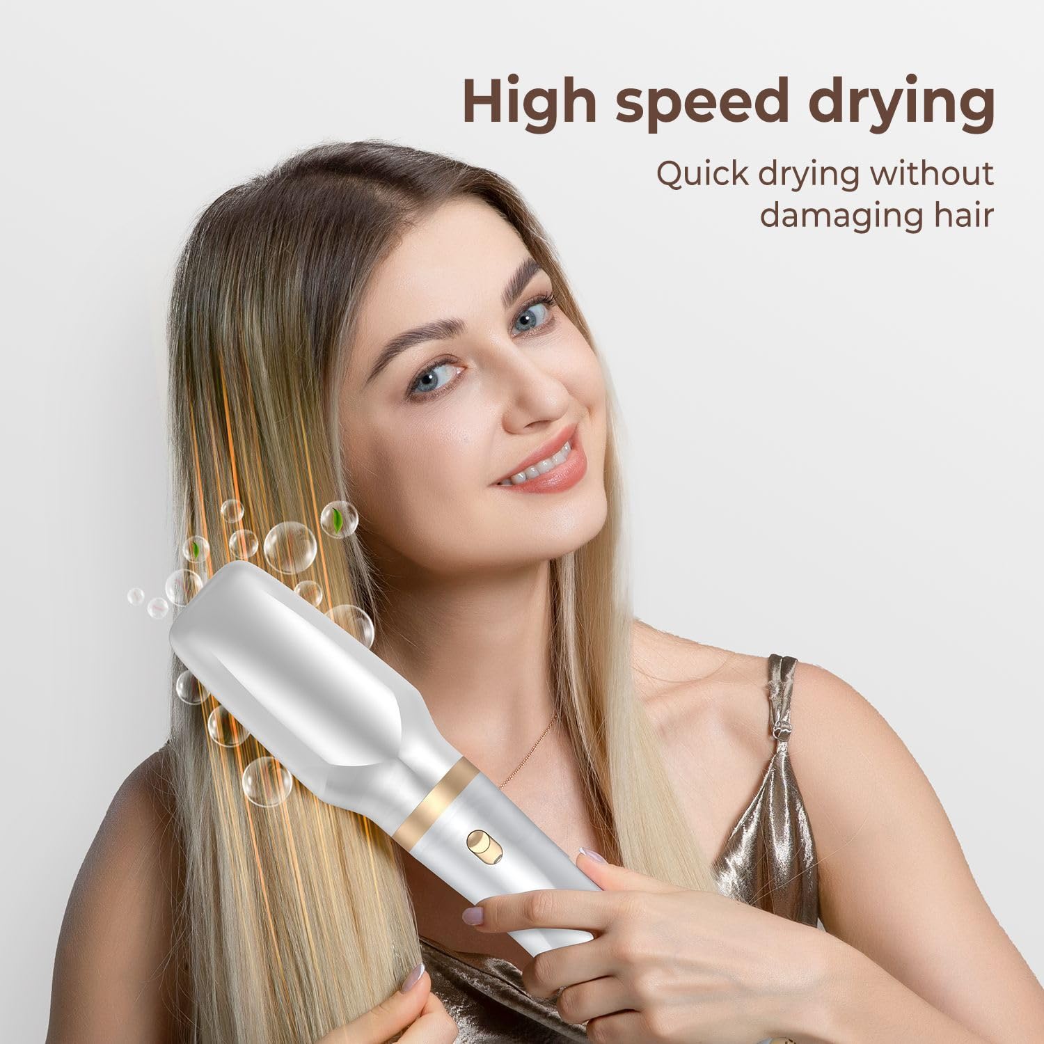 Close up of the sixty thousand RPM high speed air styler handle detailing the three temperature setting switches and the ergonomic grip design.